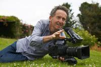Picture of Jeremy holding a large camera